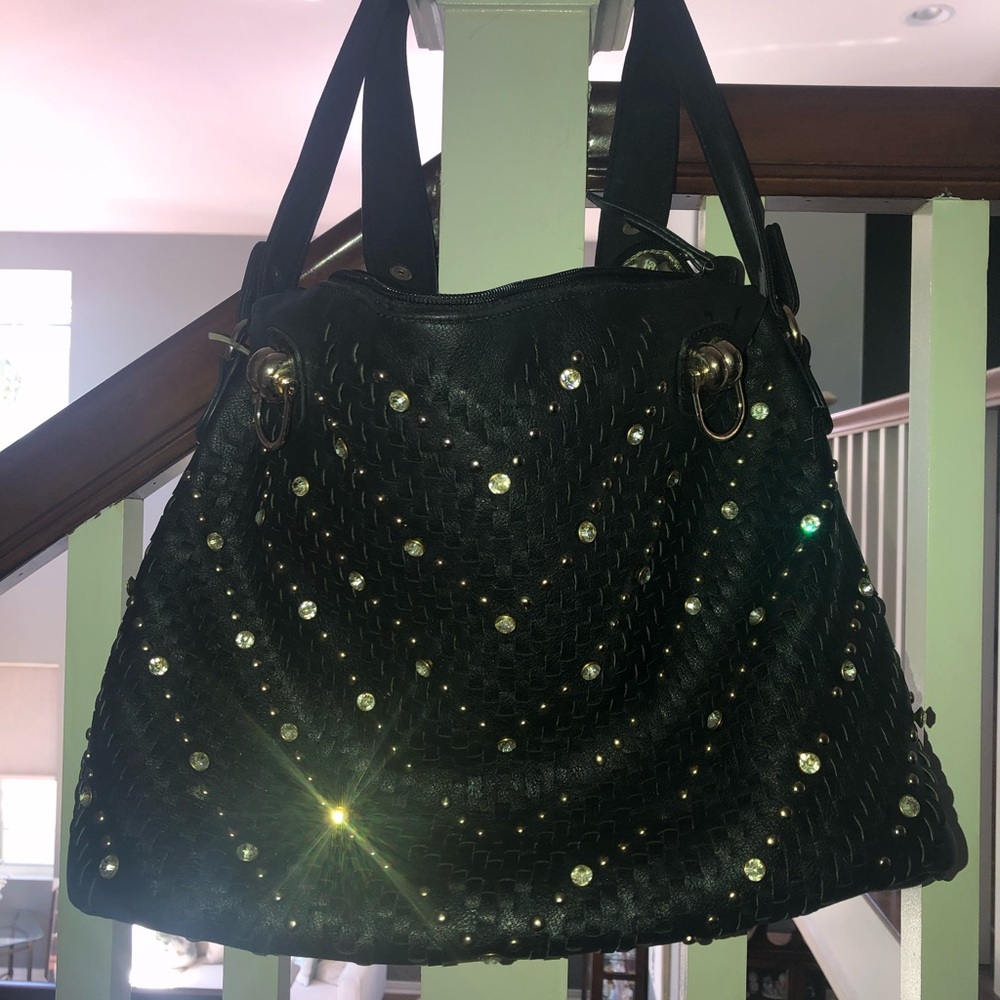 Black and gold studded leather purse